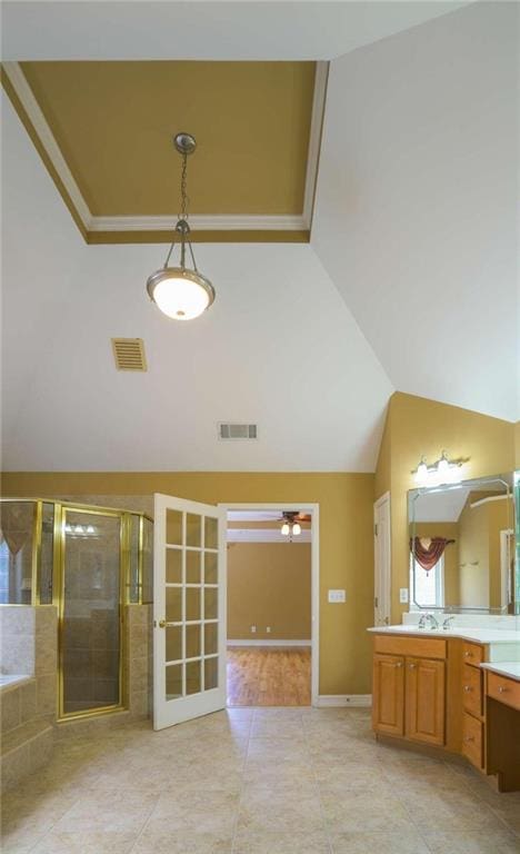 bathroom featuring high vaulted ceiling, vanity, crown molding, plus walk in shower, and tile patterned flooring