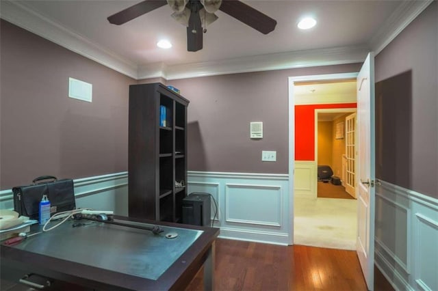 home office with crown molding, dark hardwood / wood-style floors, and ceiling fan