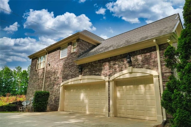 view of home's exterior featuring a garage