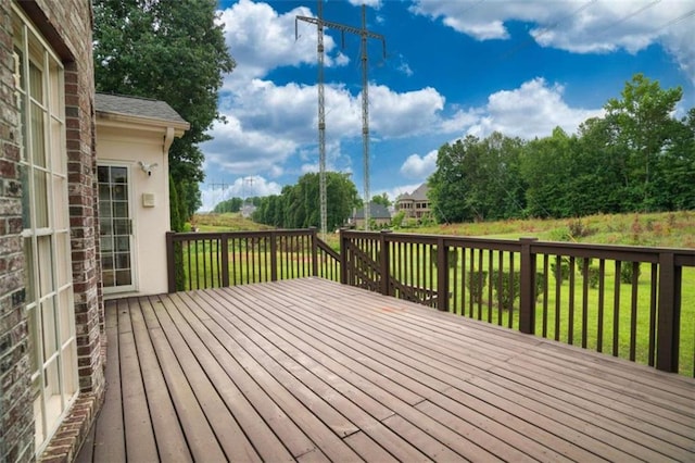 deck featuring a lawn