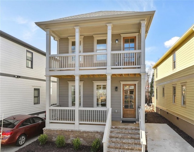 106 Hogue St, Atlanta, GA 30312 - view of front of house featuring a balcony and covered porch
