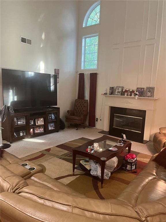 947 Simonton View Ln, Lawrenceville, GA 30045 - living area with a fireplace with flush hearth and a towering ceiling