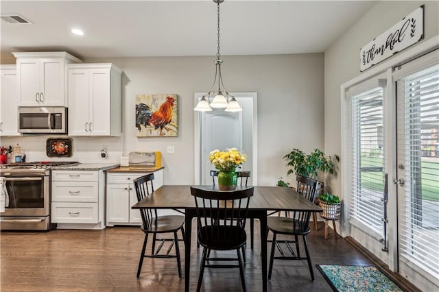 297 Cobblestone Trl, Dallas, GA 30132 - dining area featuring dark wood-style floors, plenty of natural light, recessed lighting, and french doors