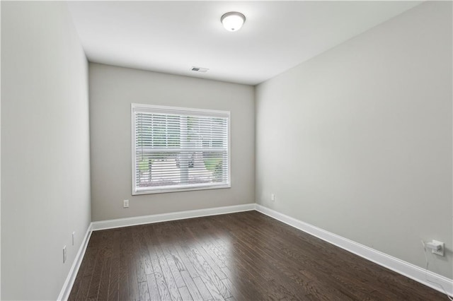 297 Cobblestone Trl, Dallas, GA 30132 - spare room with dark wood-type flooring and baseboards