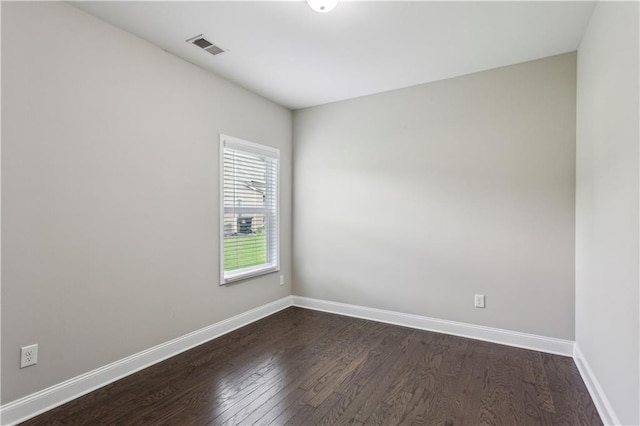 297 Cobblestone Trl, Dallas, GA 30132 - spare room with dark wood-type flooring