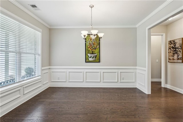 297 Cobblestone Trl, Dallas, GA 30132 - unfurnished dining area with a chandelier, dark wood-style floors, and crown molding