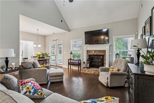 297 Cobblestone Trl, Dallas, GA 30132 - living area featuring healthy amount of natural light, dark wood-style flooring, ceiling fan, and high vaulted ceiling