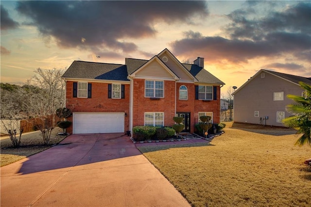 view of front of property with a garage