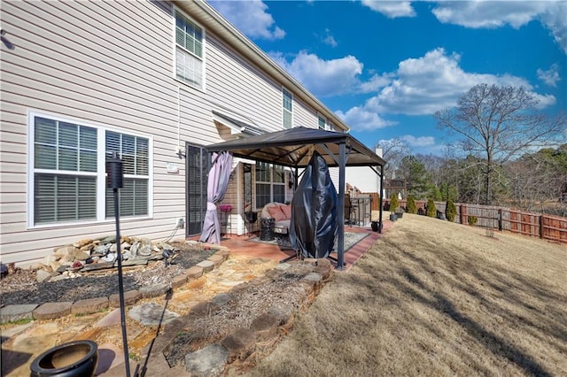 exterior space featuring a gazebo, a yard, and a patio area