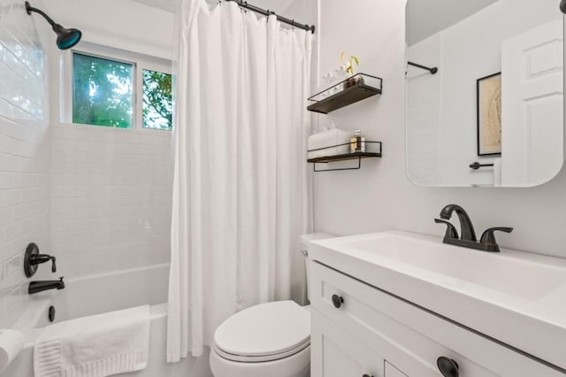 full bathroom with toilet, shower / tub combo, and vanity