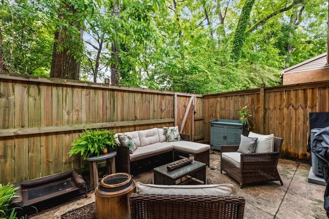 view of patio / terrace with an outdoor hangout area and a fenced backyard
