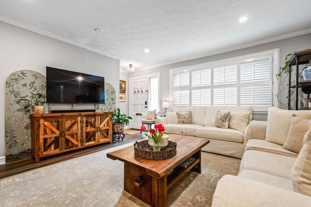 living room featuring crown molding, recessed lighting, wood finished floors, and baseboards