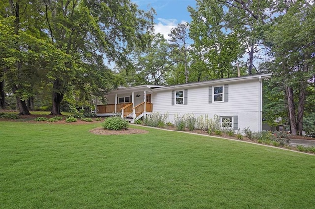 5666 Fawn Dr, Powder Springs, GA 30127 - ranch-style house featuring a front yard and a wooden deck
