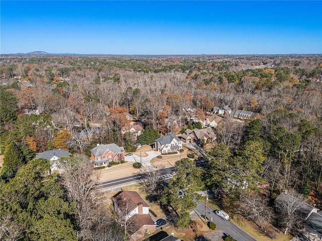 aerial view featuring a view of trees