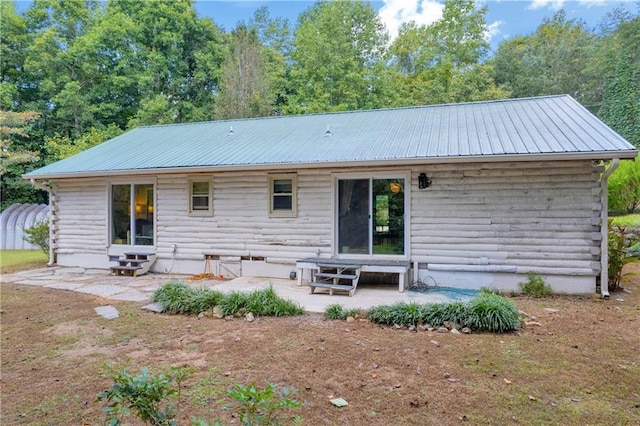 168 Silver Fox Dr, Dawsonville, GA 30534 - rear view of property with entry steps, a patio, metal roof, and log siding