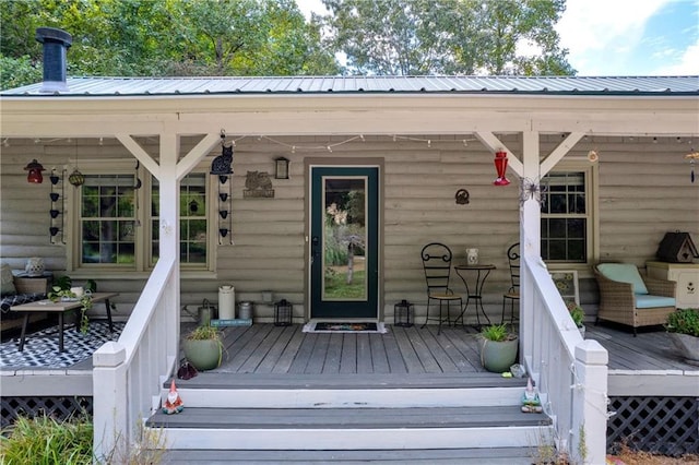 168 Silver Fox Dr, Dawsonville, GA 30534 - doorway to property featuring metal roof and a deck