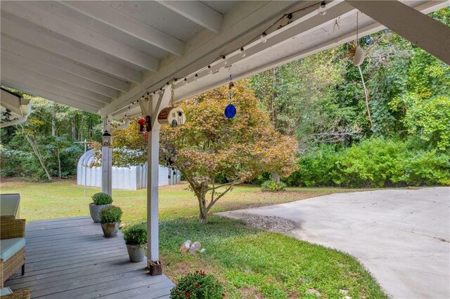 168 Silver Fox Dr, Dawsonville, GA 30534 - wooden terrace with a lawn and a patio