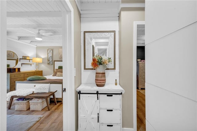 168 Silver Fox Dr, Dawsonville, GA 30534 - corridor with wood finished floors and beamed ceiling
