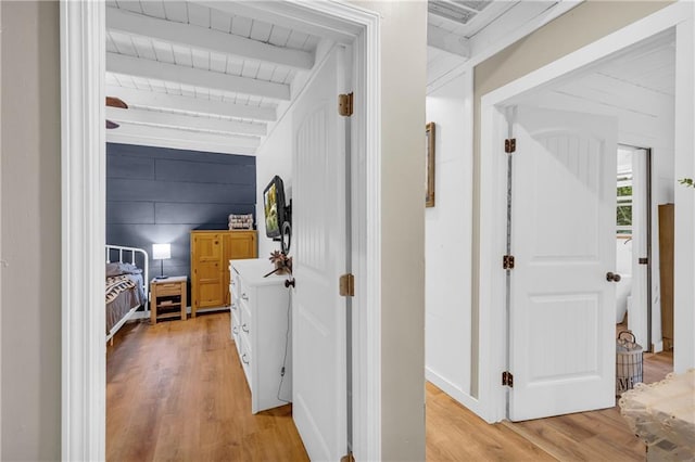 168 Silver Fox Dr, Dawsonville, GA 30534 - corridor with light wood-style floors and beamed ceiling