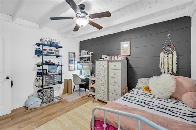 168 Silver Fox Dr, Dawsonville, GA 30534 - bedroom featuring wood finished floors, beam ceiling, and a ceiling fan