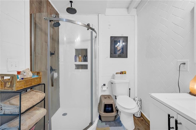 168 Silver Fox Dr, Dawsonville, GA 30534 - full bathroom with a shower stall, toilet, vanity, and wood finished floors