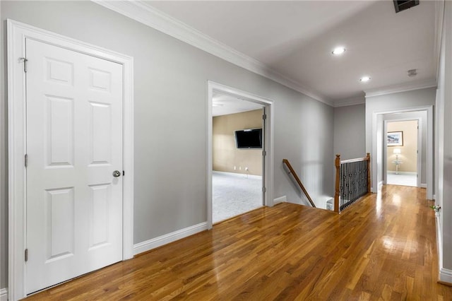 895 Ovalene Ln SW, Marietta, GA 30064 - hall featuring wood finished floors, an upstairs landing, baseboards, and recessed lighting