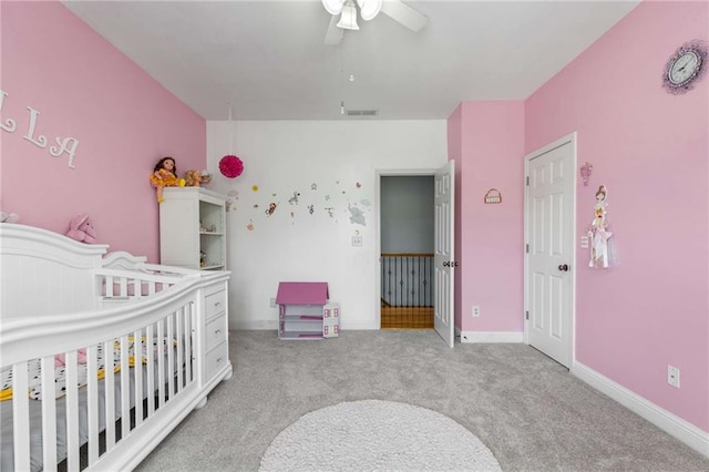 895 Ovalene Ln SW, Marietta, GA 30064 - bedroom featuring baseboards, light carpet, visible vents, and ceiling fan