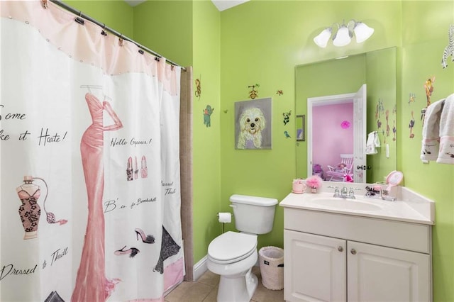 895 Ovalene Ln SW, Marietta, GA 30064 - full bath with vanity, toilet, a shower with shower curtain, and tile patterned floors