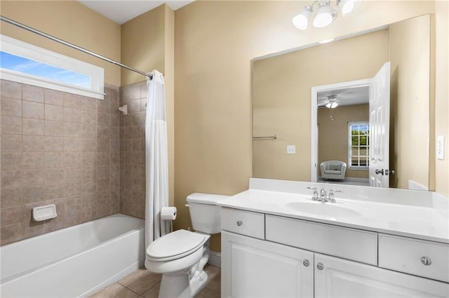 895 Ovalene Ln SW, Marietta, GA 30064 - bathroom with toilet, vanity, tile patterned flooring, a ceiling fan, and shower / tub combo