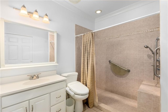 895 Ovalene Ln SW, Marietta, GA 30064 - bathroom featuring a tile shower, vanity, and toilet