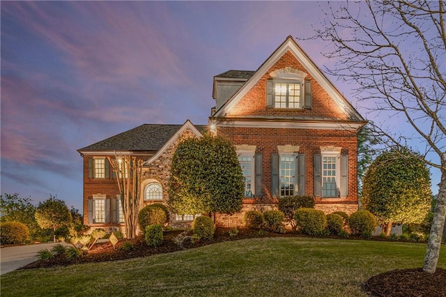 895 Ovalene Ln SW, Marietta, GA 30064 - view of front facade with a yard and brick siding