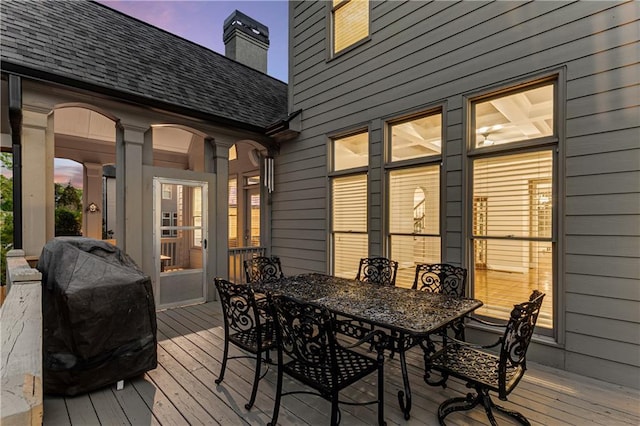 895 Ovalene Ln SW, Marietta, GA 30064 - deck at dusk with outdoor dining space and area for grilling