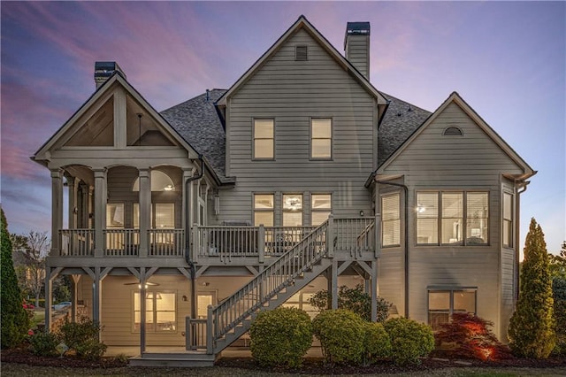 895 Ovalene Ln SW, Marietta, GA 30064 - exterior space featuring a chimney, stairs, and a shingled roof