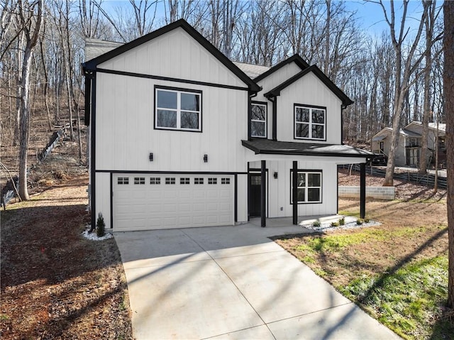 view of front of home featuring a garage and covered porch