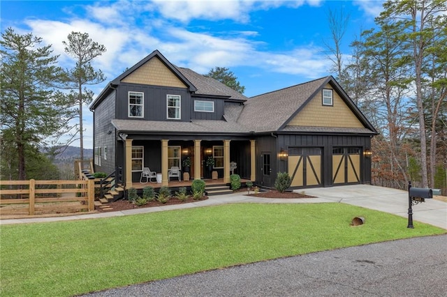 view of front of property with a porch, board and batten siding, an attached garage, driveway, and a shingled roof