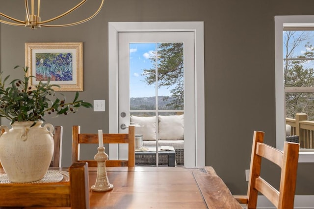 dining area with a chandelier