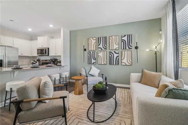 living room featuring light hardwood / wood-style flooring