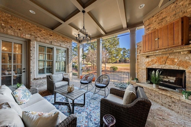 view of patio / terrace with an outdoor stone fireplace