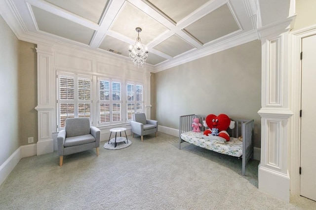 sitting room featuring carpet, ornate columns, coffered ceiling, crown molding, and a chandelier