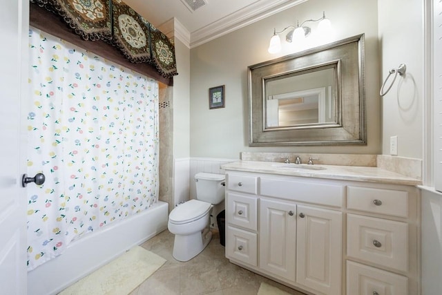 full bathroom featuring tile patterned floors, shower / bath combination with curtain, toilet, vanity, and ornamental molding