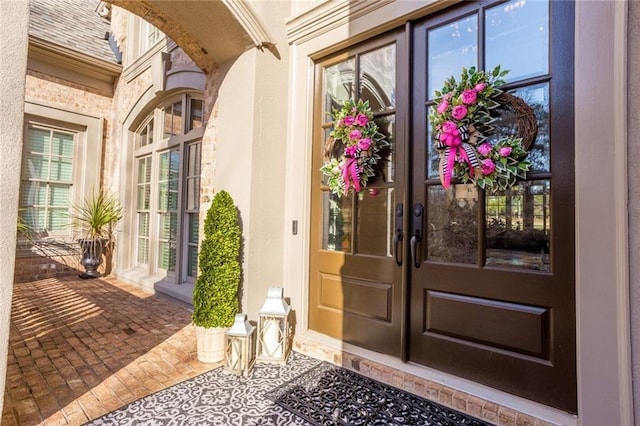 entrance to property with a patio area