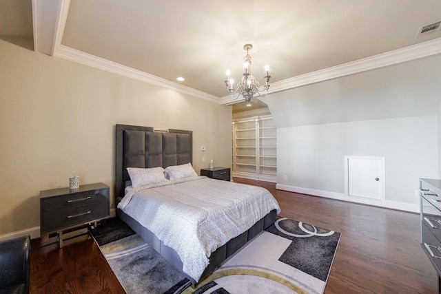 bedroom with dark hardwood / wood-style floors, crown molding, and a chandelier