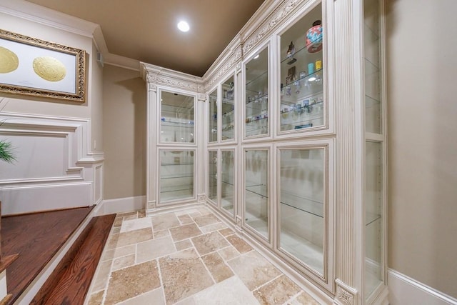 interior space with crown molding