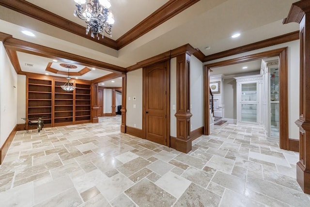 corridor featuring a chandelier and crown molding