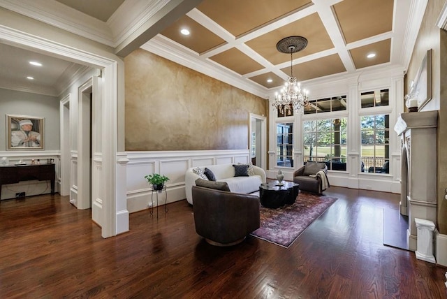 sitting room featuring coffered ceiling, dark hardwood / wood-style floors, ornamental molding, beamed ceiling, and a chandelier