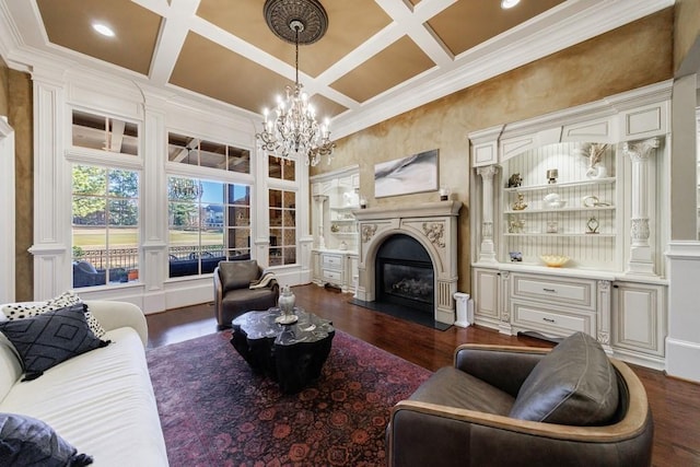 living room with beam ceiling, coffered ceiling, dark hardwood / wood-style floors, a chandelier, and ornamental molding