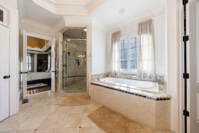 bathroom with crown molding and shower with separate bathtub