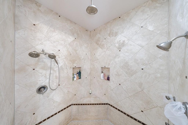 bathroom featuring tiled shower