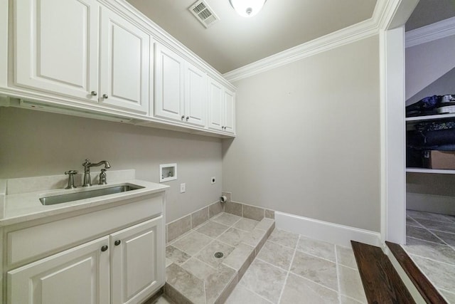 washroom featuring sink, cabinets, electric dryer hookup, hookup for a washing machine, and ornamental molding