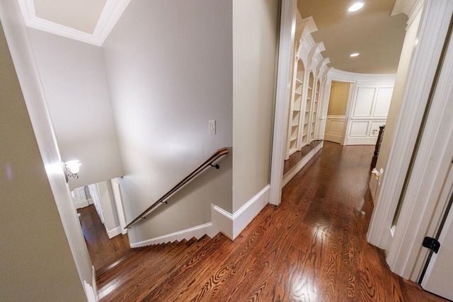 hall featuring dark hardwood / wood-style floors and ornamental molding